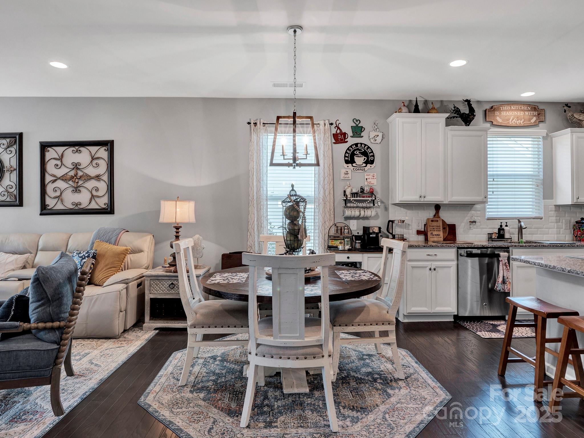 3129 Bridgewater Street, Unit 3E61 Lancaster, SC 29720 - Photo 11 of 48 a large kitchen with a table and chairs