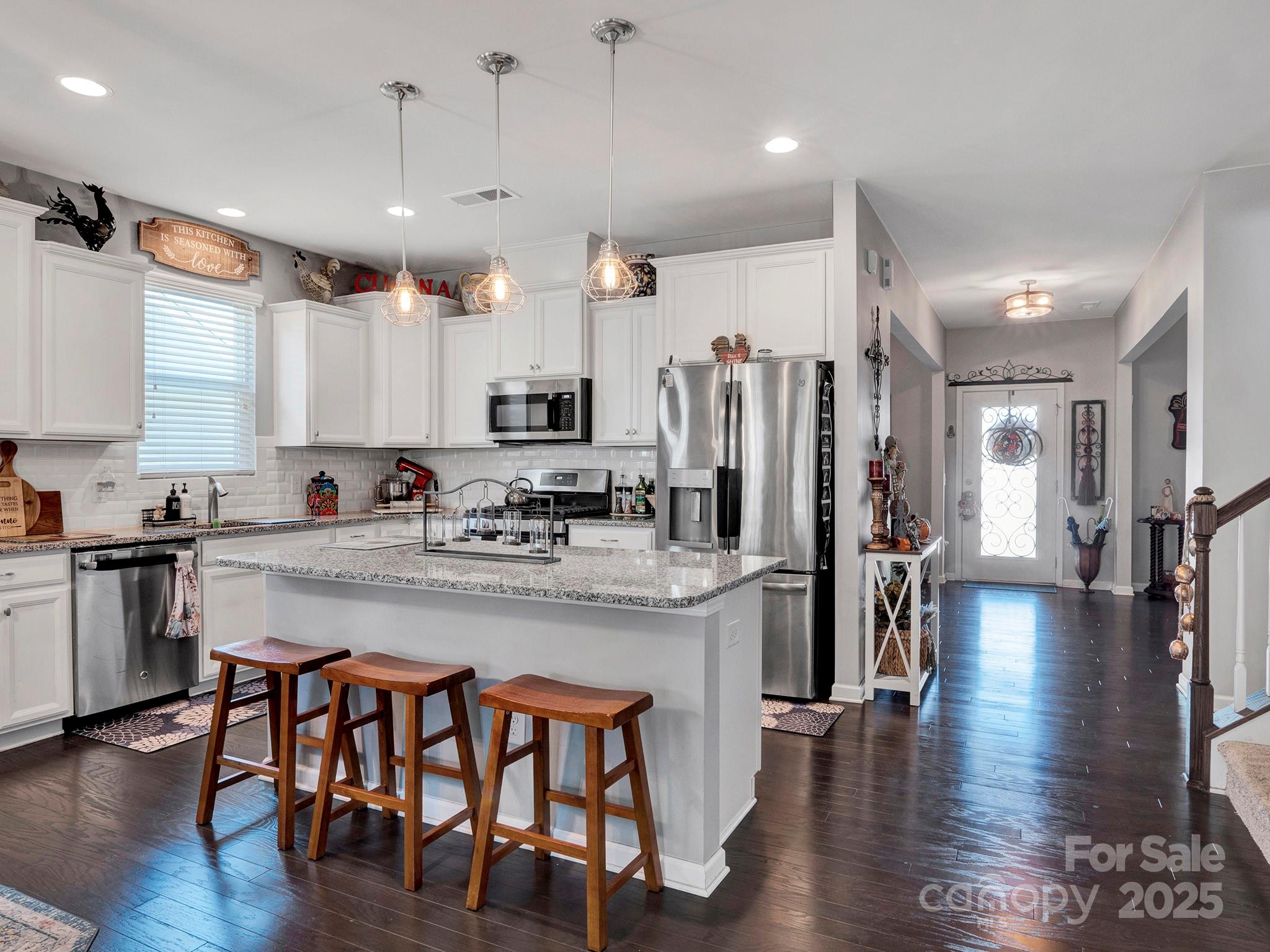 3129 Bridgewater Street, Unit 3E61 Lancaster, SC 29720 - Photo 15 of 48 a large kitchen with a table and chairs