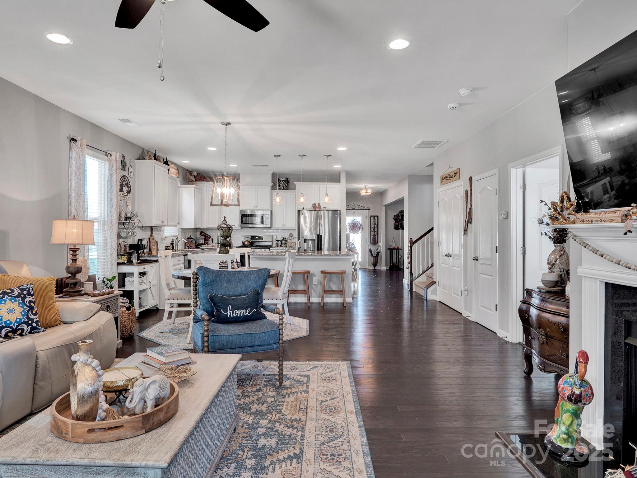 3129 Bridgewater Street, Unit 3E61 Lancaster, SC 29720 - Photo 18 of 48 a living room with furniture and a flat screen tv