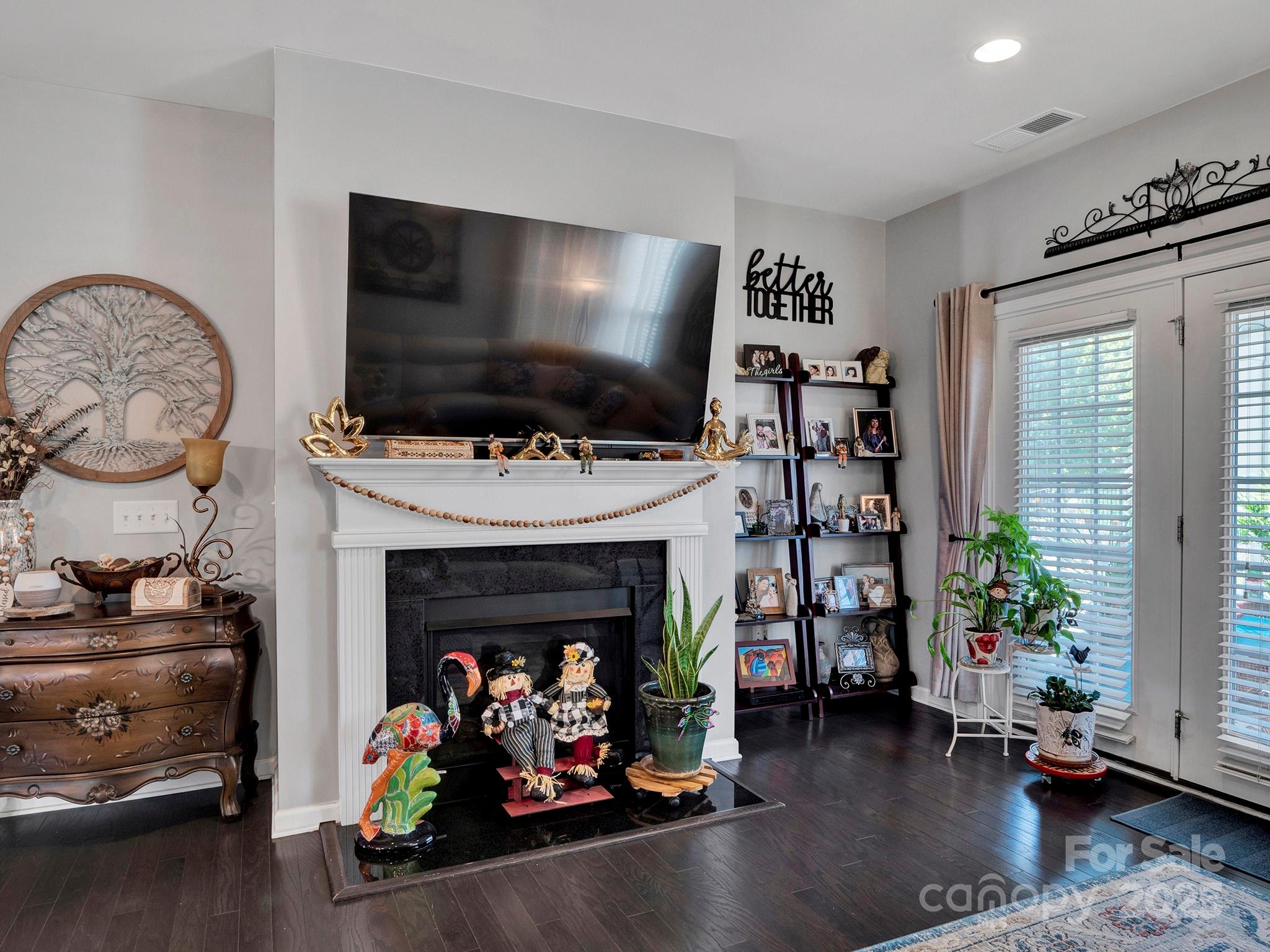 3129 Bridgewater Street, Unit 3E61 Lancaster, SC 29720 - Photo 19 of 48 a room with furniture and a flat screen tv