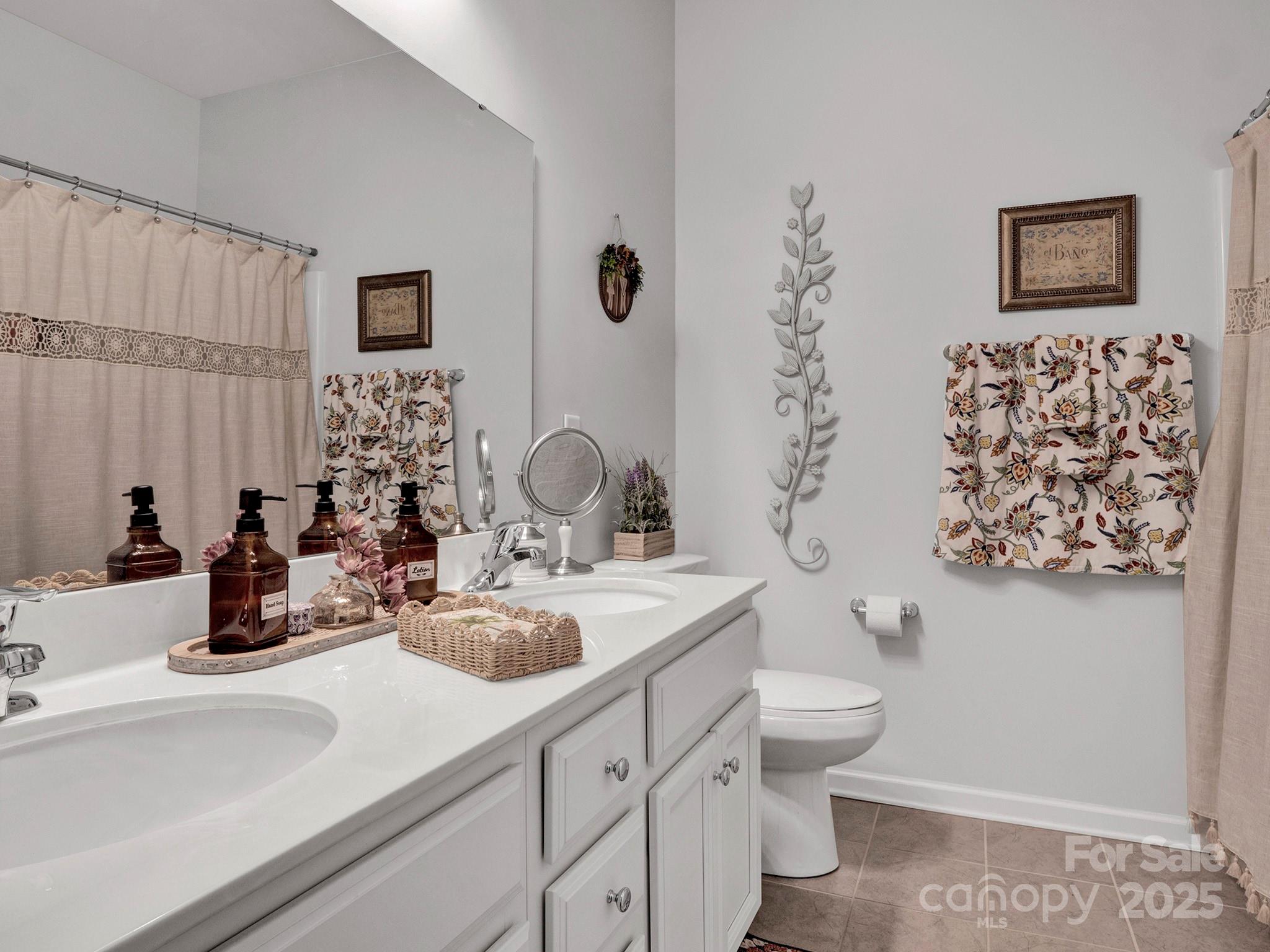 3129 Bridgewater Street, Unit 3E61 Lancaster, SC 29720 - Photo 28 of 48 a bathroom with a sink toilet and shower