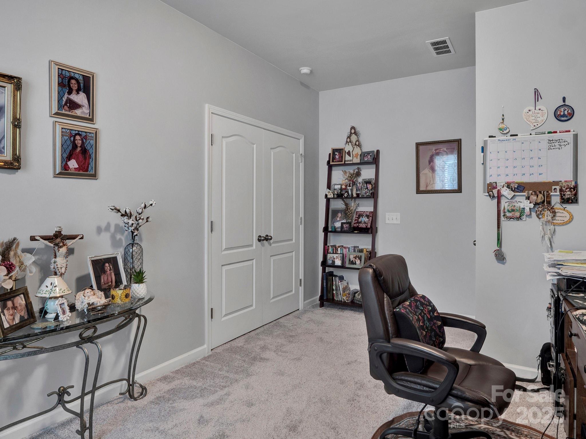 3129 Bridgewater Street, Unit 3E61 Lancaster, SC 29720 - Photo 30 of 48 a view of a workspace with furniture and toys