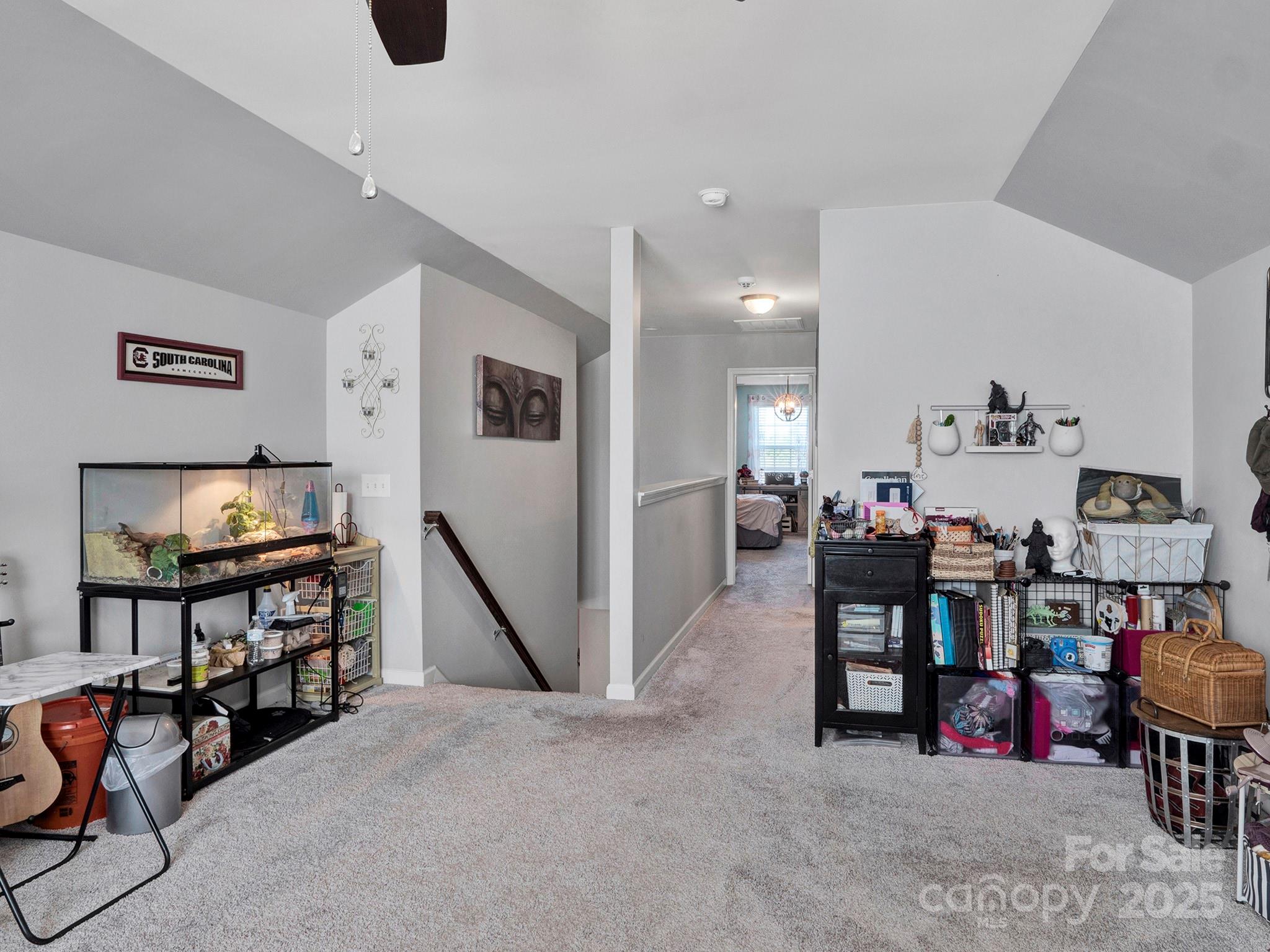 3129 Bridgewater Street, Unit 3E61 Lancaster, SC 29720 - Photo 34 of 48 a living room with furniture and a flat screen tv