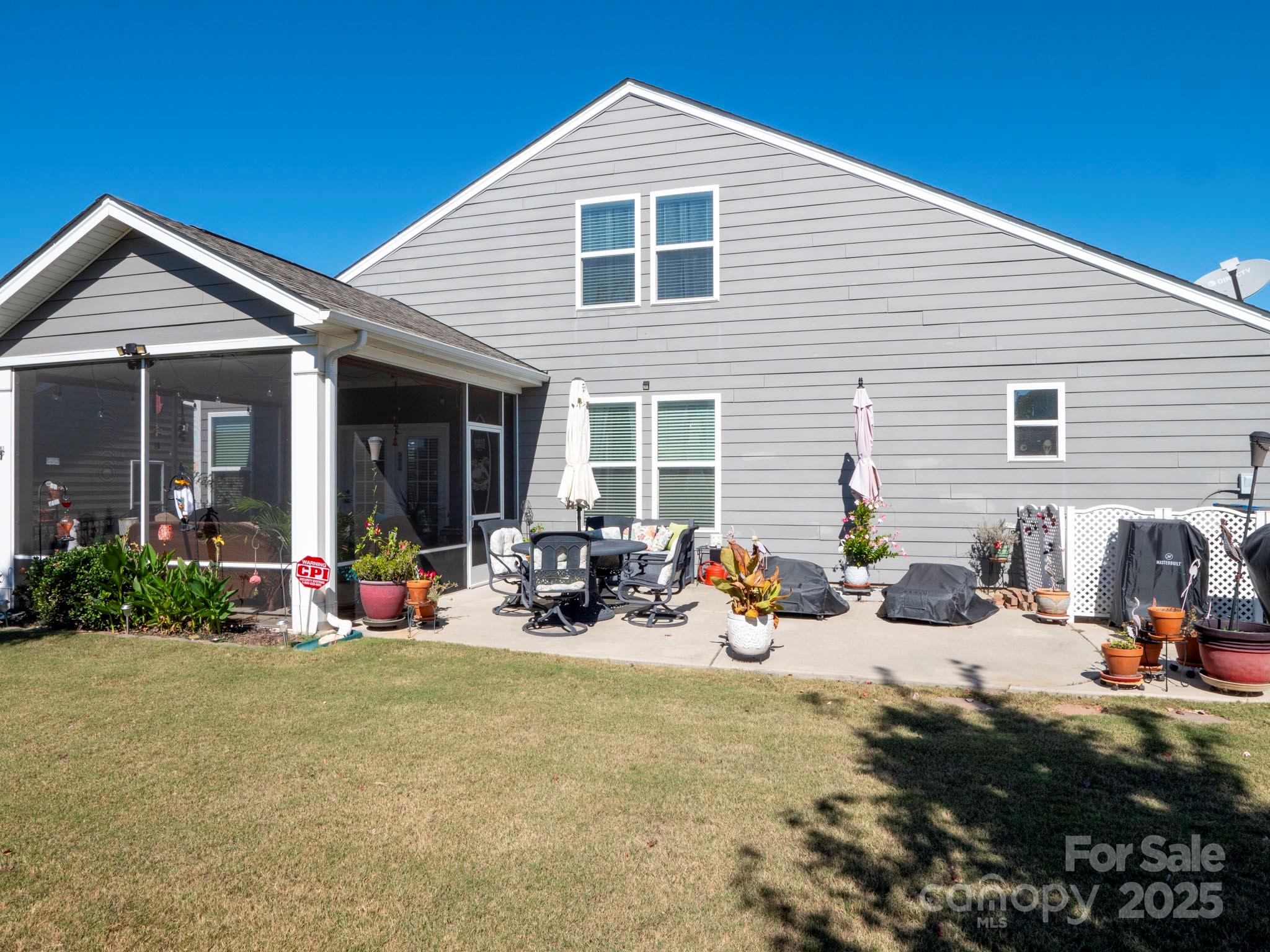 3129 Bridgewater Street, Unit 3E61 Lancaster, SC 29720 - Photo 41 of 48 a view of a house with backyard and sitting area
