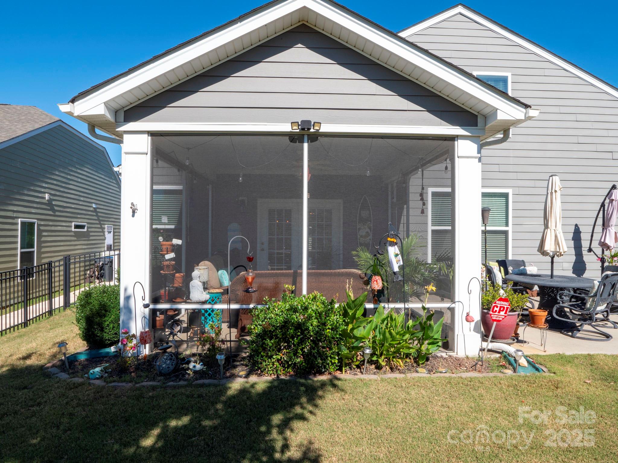 3129 Bridgewater Street, Unit 3E61 Lancaster, SC 29720 - Photo 43 of 48 a front view of a house with garden
