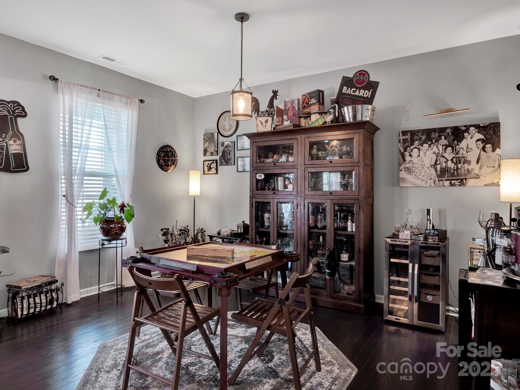 3129 Bridgewater Street, Unit 3E61 Lancaster, SC 29720 - Photo 6 of 48 a view of a dining room with furniture and wooden floor