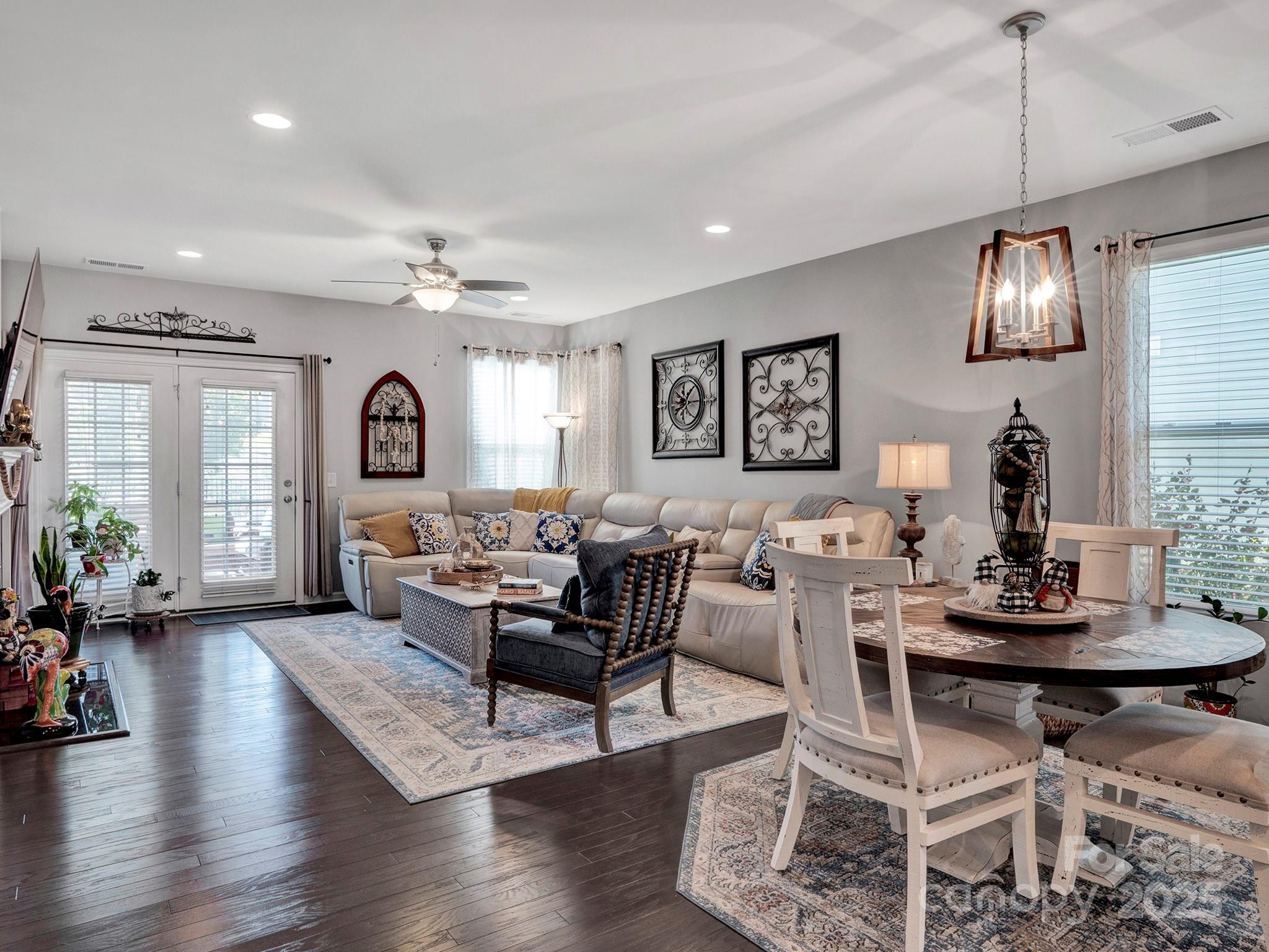3129 Bridgewater Street, Unit 3E61 Lancaster, SC 29720 - Photo 10 of 48 a living room with furniture or window and a wooden floor