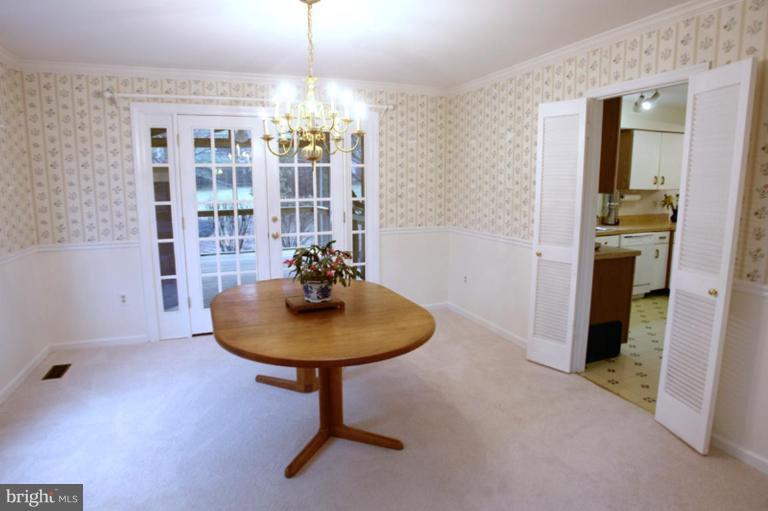 21014 Blunt Road Germantown, MD 20876 - Photo 5 of 30 Dining room has French doors to the porch.