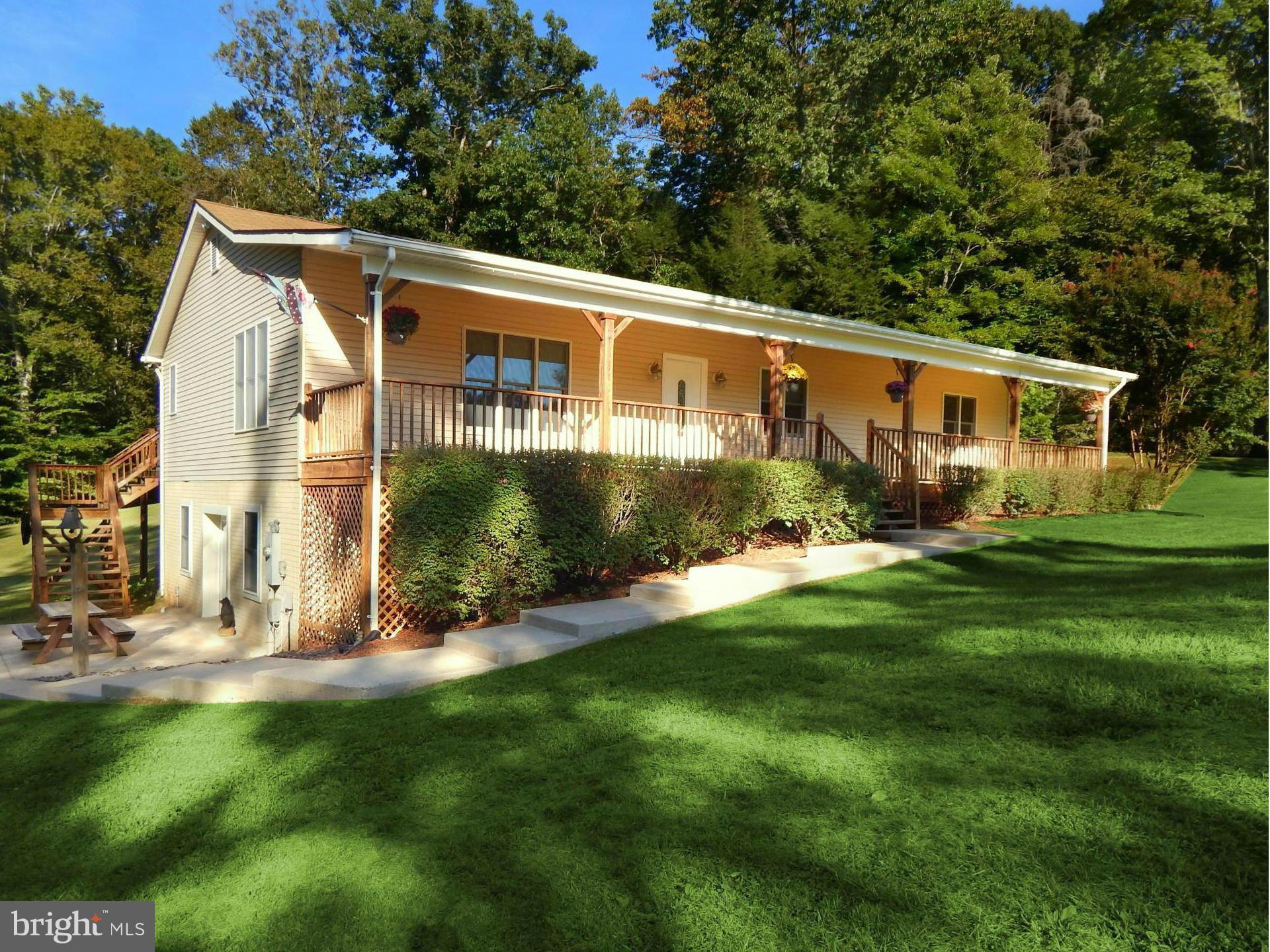 8246 Sinclair Mill Road Manassas, VA 20112 - Photo 1 of 30 Front View of Home and Side Patio