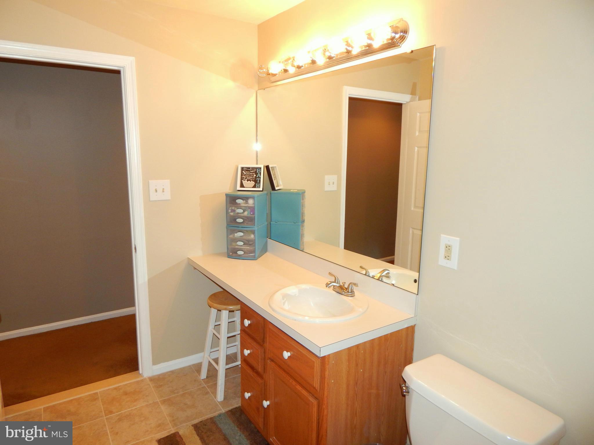 8246 Sinclair Mill Road Manassas, VA 20112 - Photo 15 of 30 Full Bathroom in Main Level Hallway, View #2