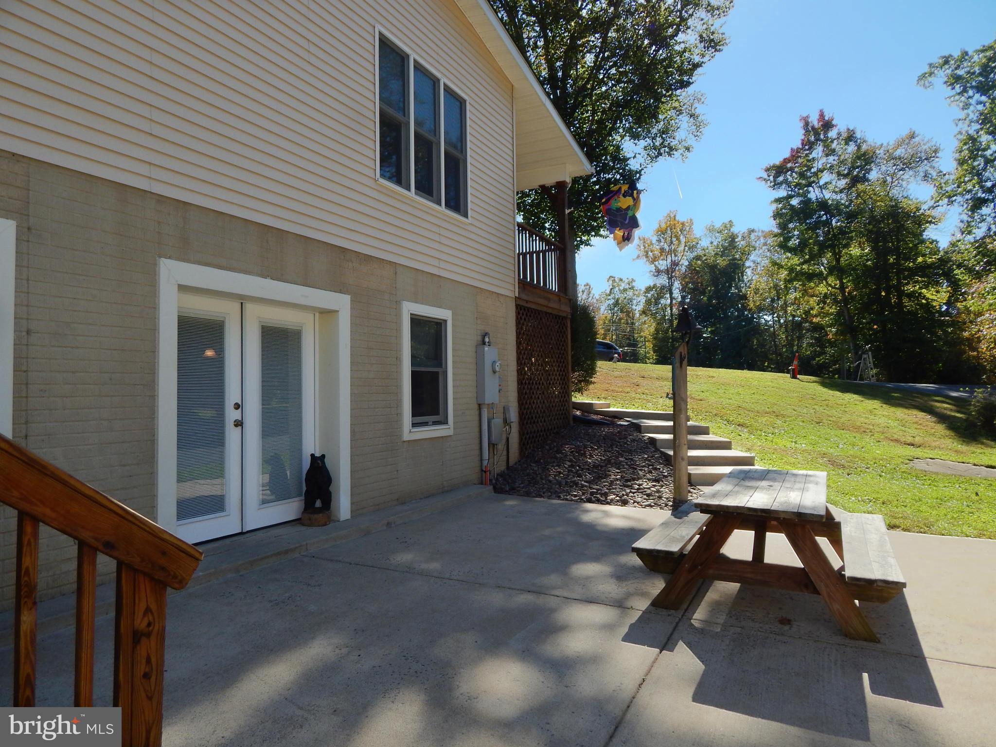 8246 Sinclair Mill Road Manassas, VA 20112 - Photo 28 of 30 Side Patio and Basement Side Entrance