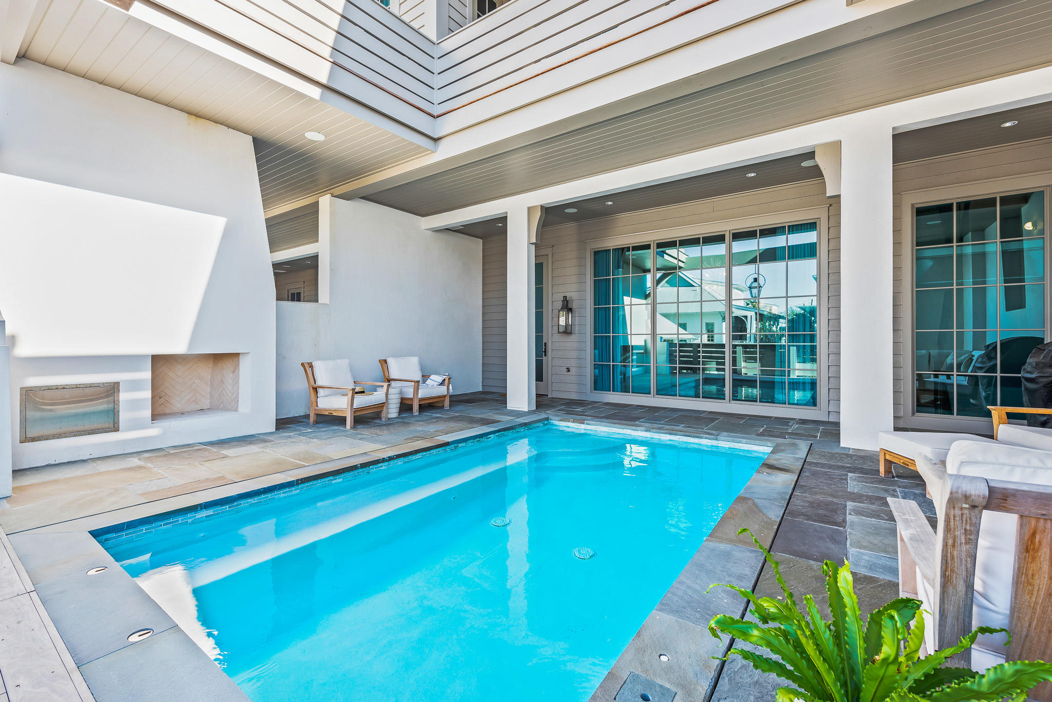 16 South Barrett Square, Unit 4 Inlet Beach, FL 32461 - Photo 35 of 98 a swimming pool with outdoor seating and yard