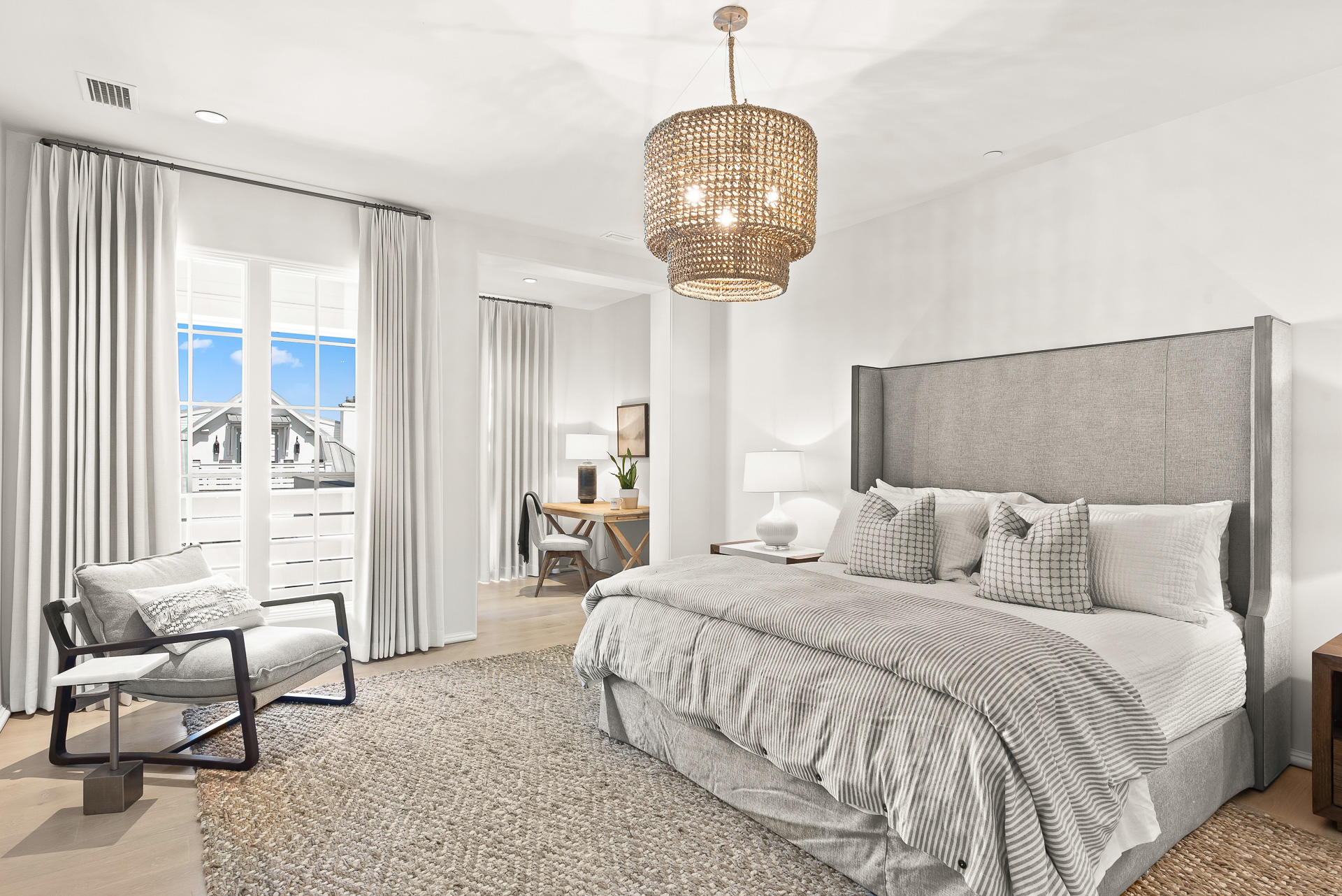 16 South Barrett Square, Unit 4 Inlet Beach, FL 32461 - Photo 46 of 98 a bedroom with a bed and chandelier