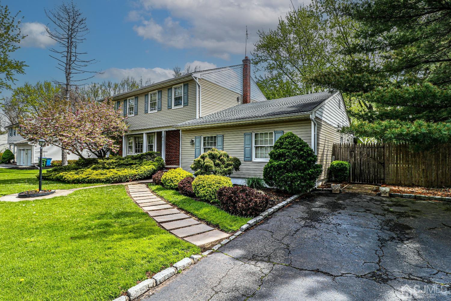 406 Plainfield Road Edison, NJ 08820 - Photo 3 of 41 a front view of a house with a yard