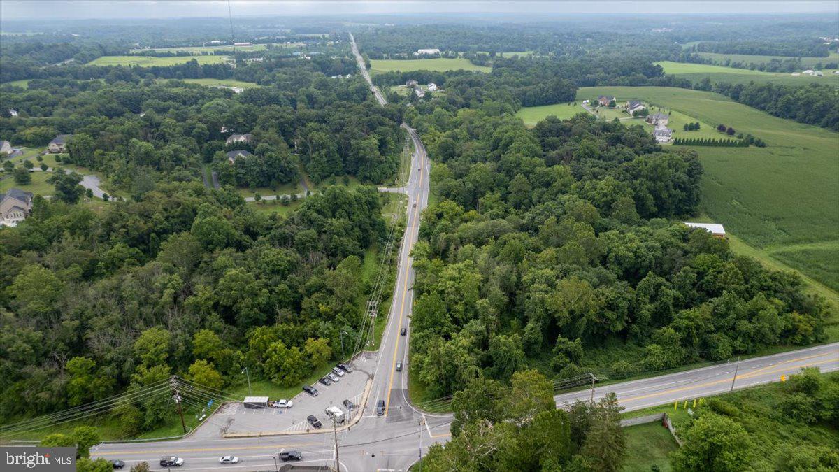 14459 Frederick Road Cooksville, MD 21723 - Photo 16 of 29 an aerial view of a residential houses with outdoor space and trees