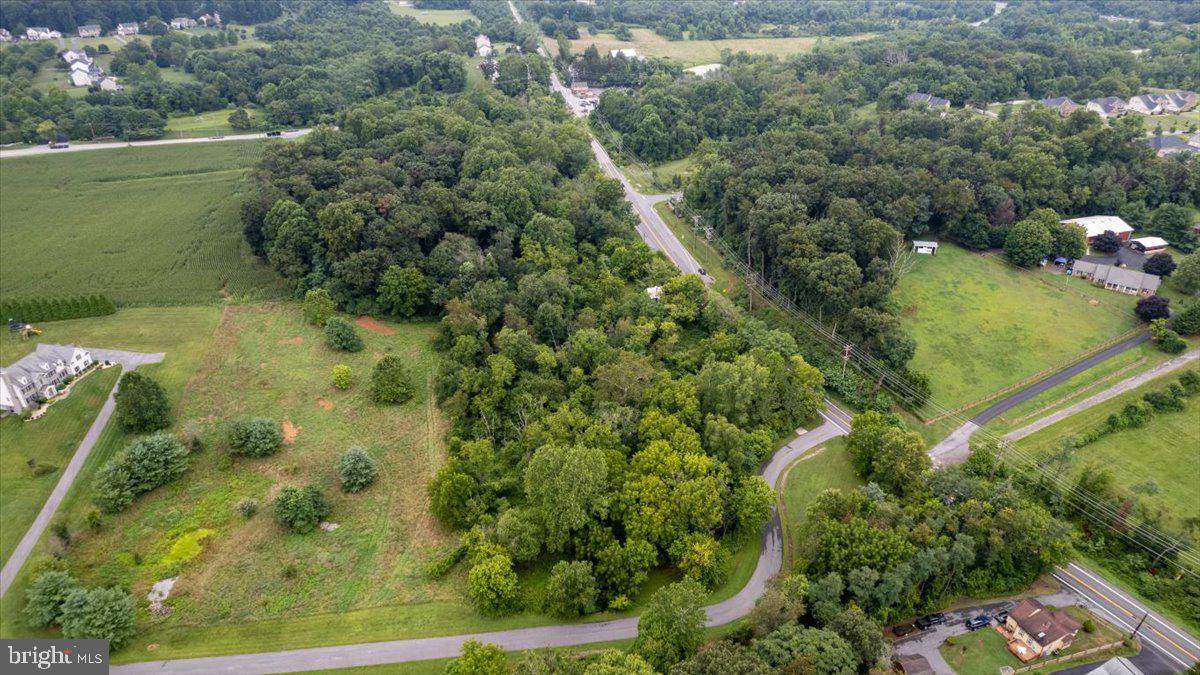 14459 Frederick Road Cooksville, MD 21723 - Photo 22 of 29 an aerial view of a residential houses with outdoor space and trees