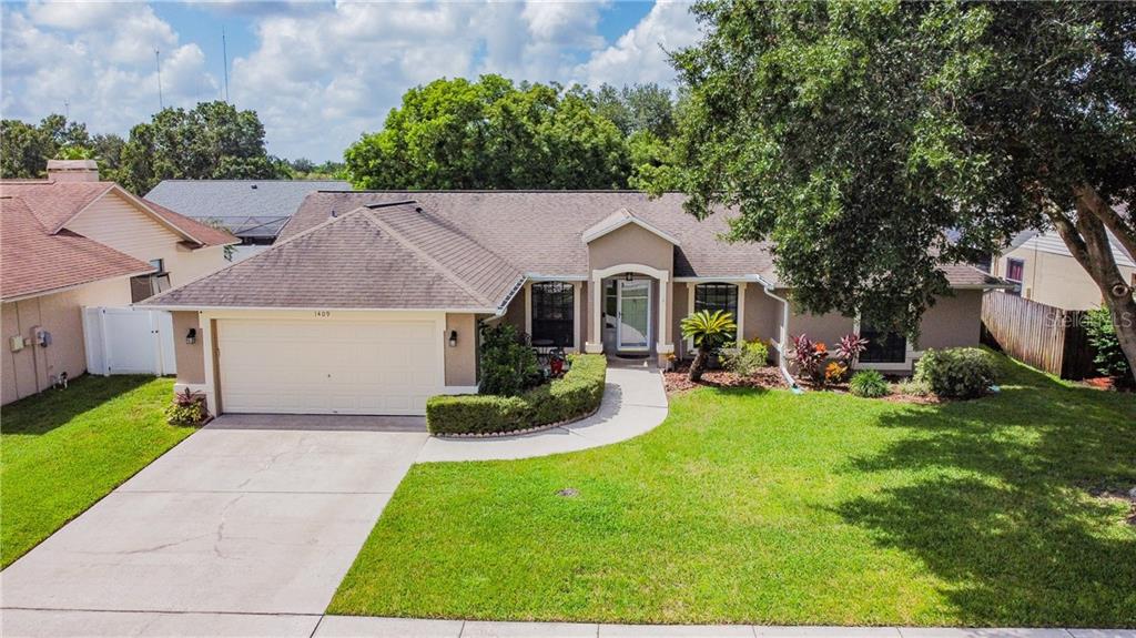 1409 Buckner Road Valrico, FL 33596 - Photo 1 of 1 Welcome to 1409 Buckner Road - front yard view.
