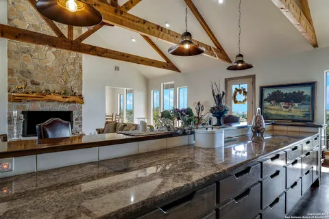 a view of a living room and a fireplace