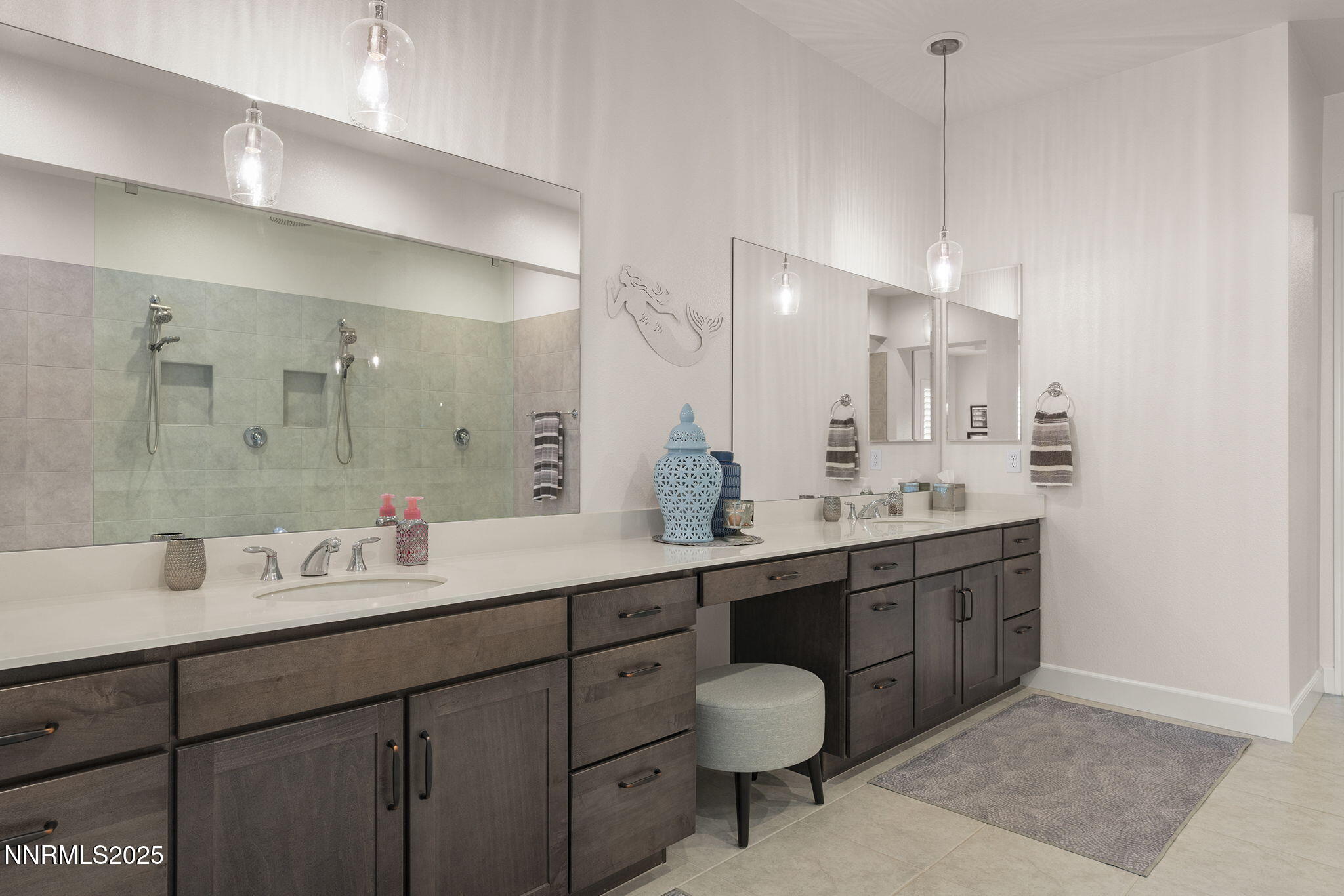 2310 Stone Rise Road Reno, NV 89521 - Photo 15 of 28 a bathroom with a sink double vanity and a mirror