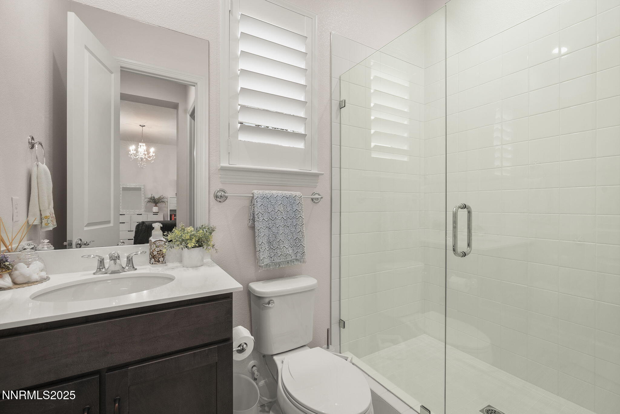 2310 Stone Rise Road Reno, NV 89521 - Photo 20 of 28 a bathroom with a sink toilet vanity and shower