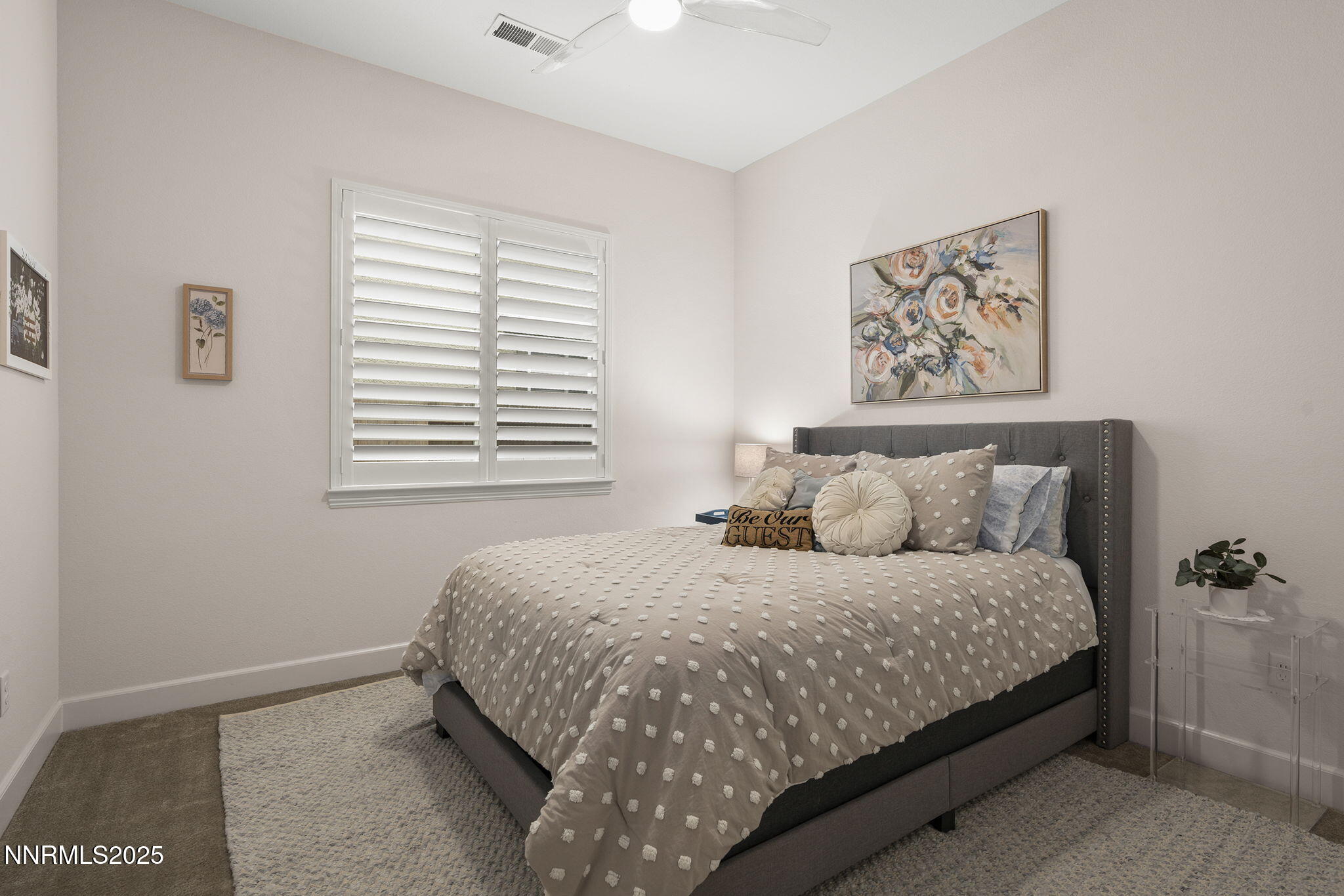 2310 Stone Rise Road Reno, NV 89521 - Photo 21 of 28 a bedroom with a bed and a window
