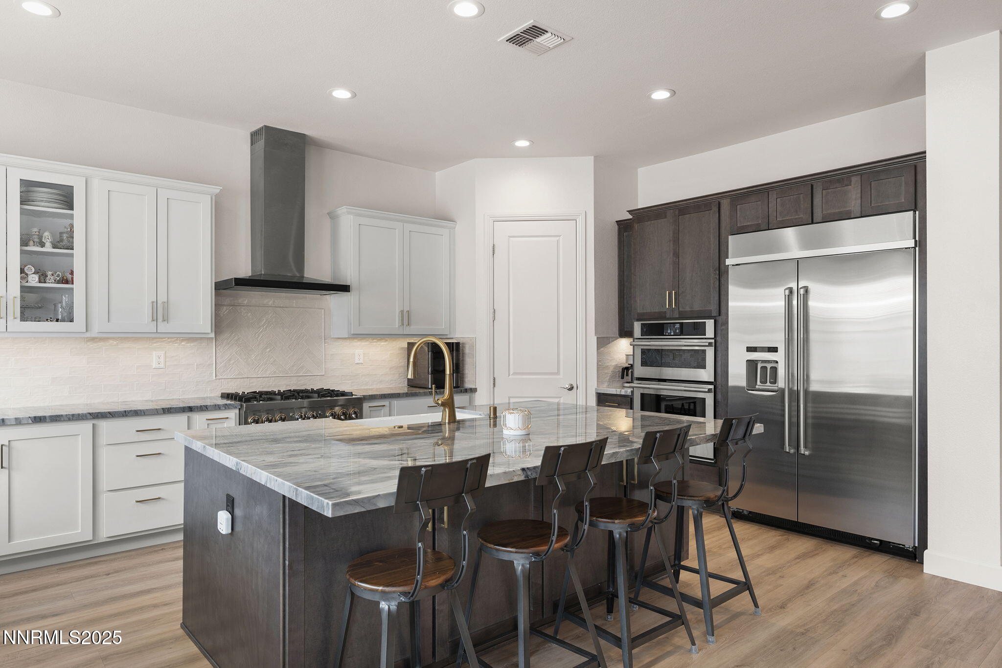 2310 Stone Rise Road Reno, NV 89521 - Photo 8 of 28 a kitchen with a table and chairs in it