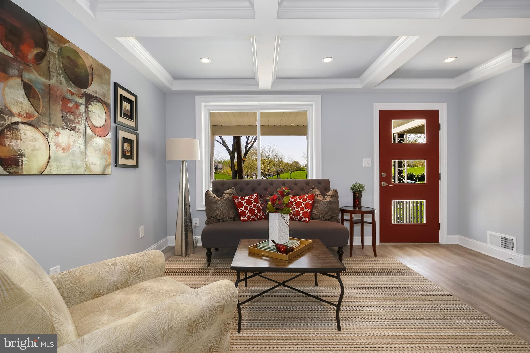 4822 Sargent Road Northeast Washington, DC 20017 - Photo 3 of 30 a living room with furniture and wooden floor