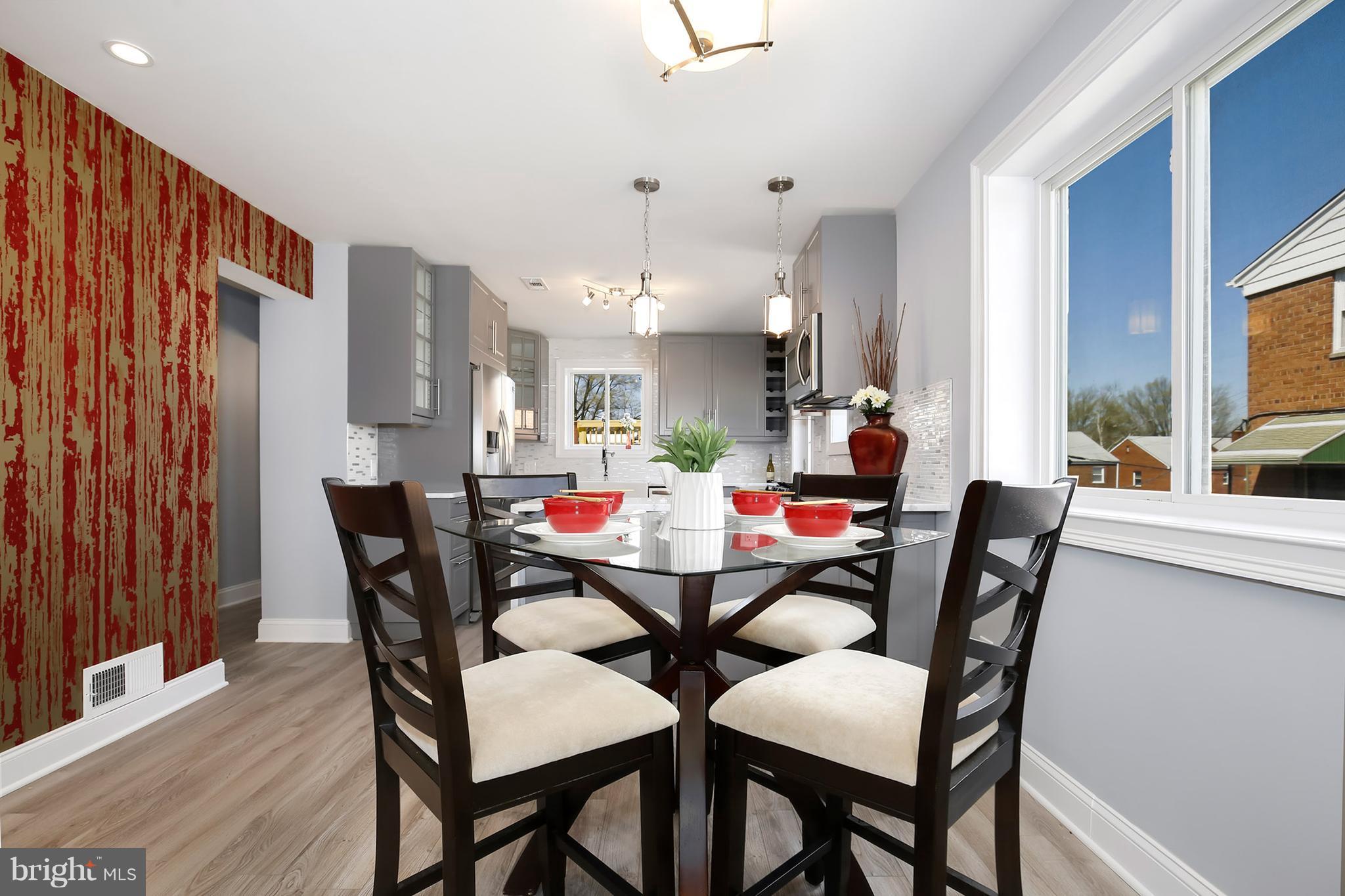 4822 Sargent Road Northeast Washington, DC 20017 - Photo 6 of 30 a dining room with furniture and window