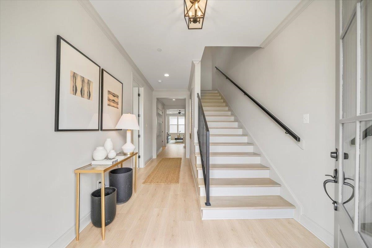 926 Aldwick Drive Collierville, TN 38017 - Photo 3 of 39 a view of entryway and hall with wooden floor
