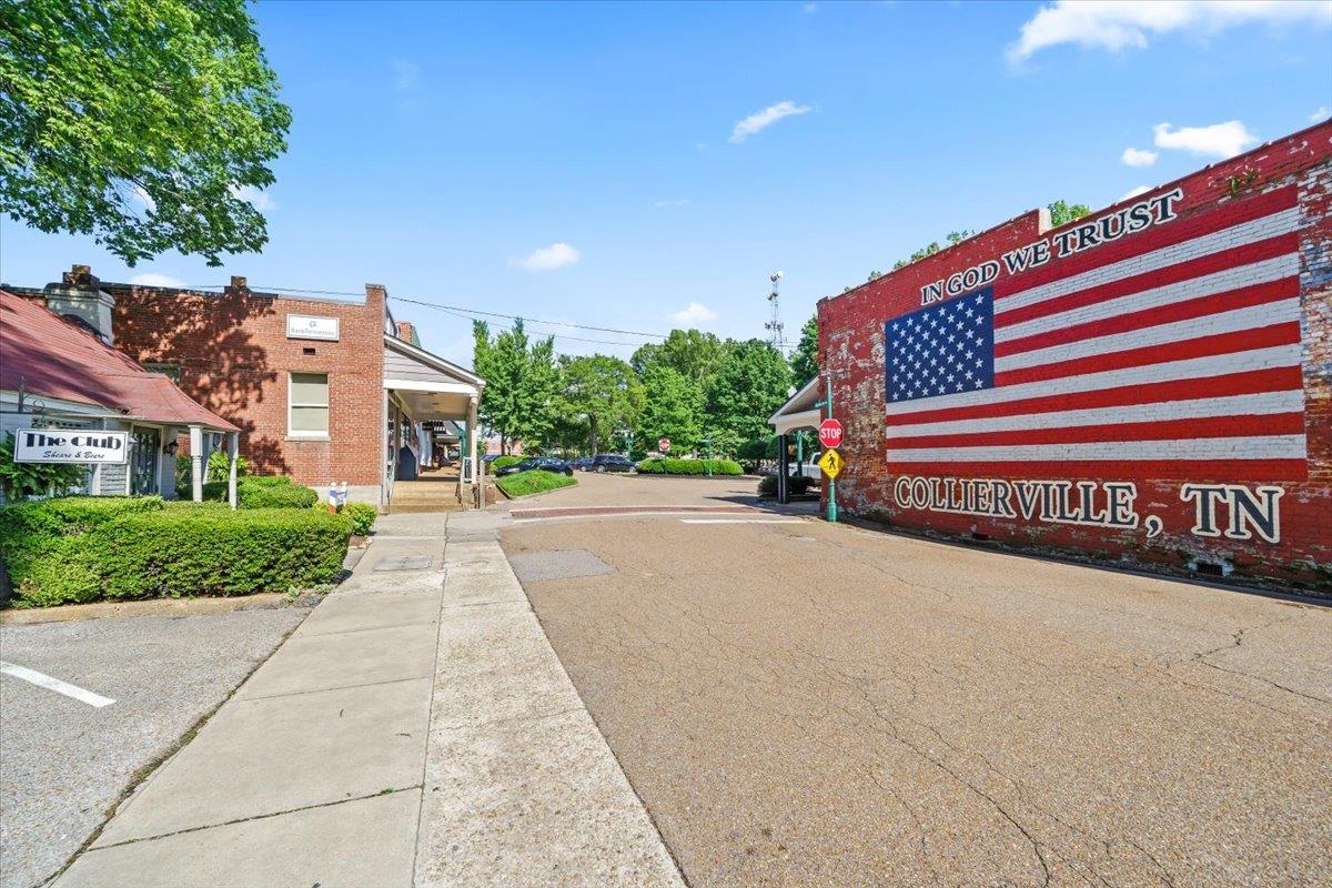 926 Aldwick Drive Collierville, TN 38017 - Photo 39 of 39 a front view of a building with garden