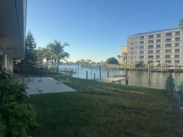 a view of a lake with a big yard