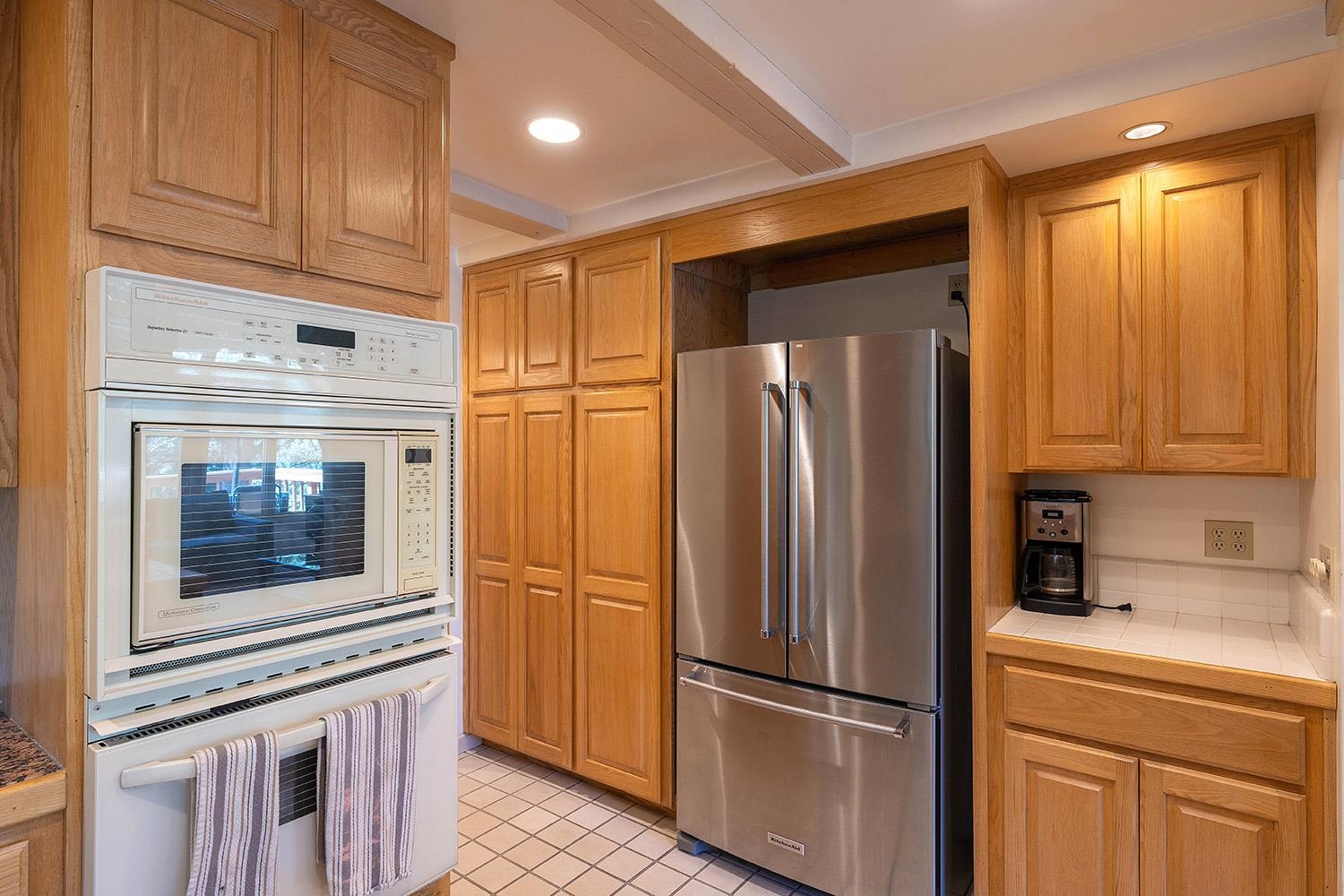 1281 Sandy Way Olympic Valley, CA 96146 - Photo 6 of 19 a kitchen with appliances and a refrigerator