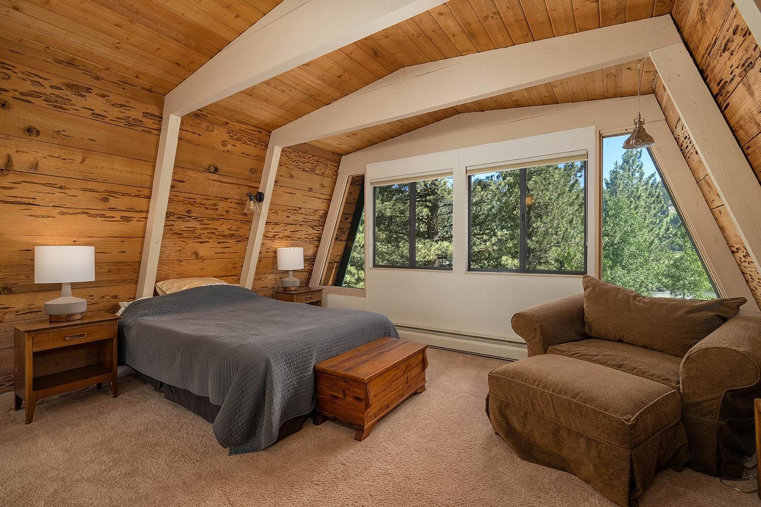 1281 Sandy Way Olympic Valley, CA 96146 - Photo 7 of 19 a bedroom with a bed couch and window