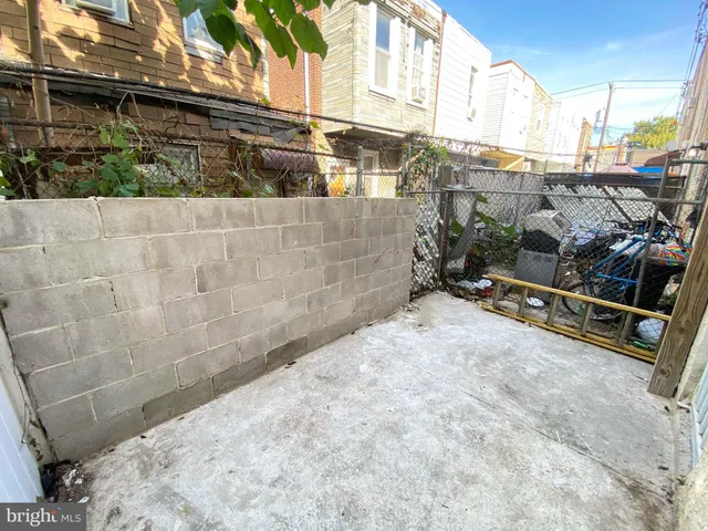 a view of a backyard of the house