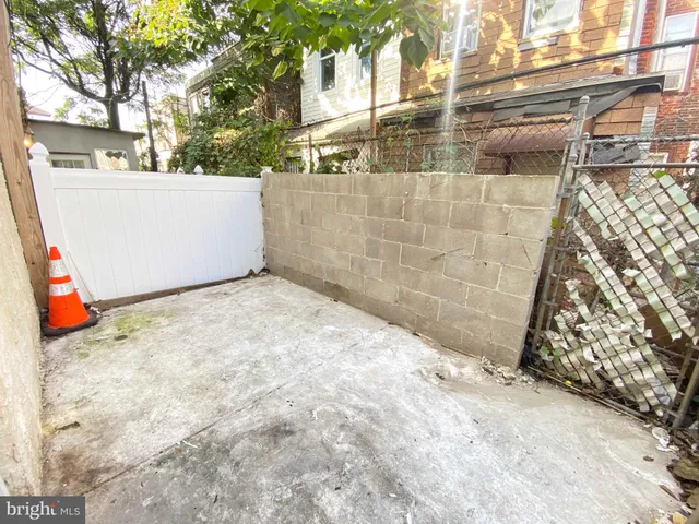 a view of a house with a snow in the yard
