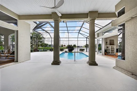 a view of an entryway with a floor to ceiling window