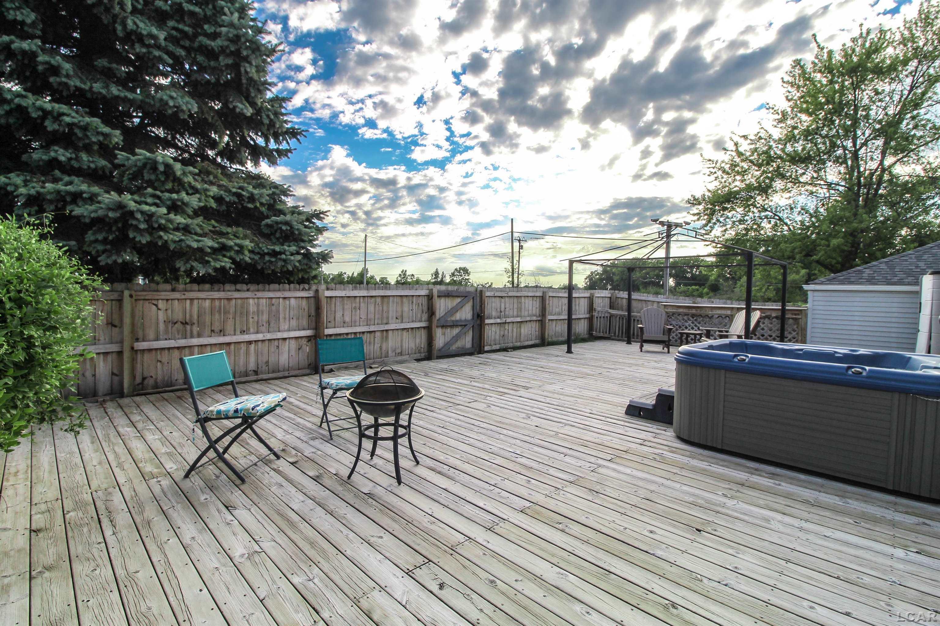 13468 Laplaisance Road Monroe, MI 48161 - Photo 30 of 38 BACK DECK/HOT TUB
