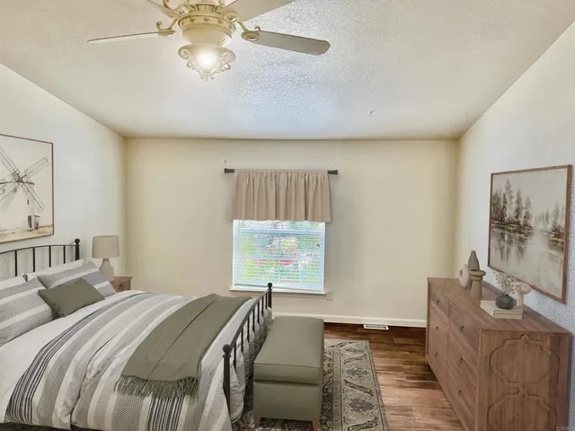 a bed room with a bed and a couch