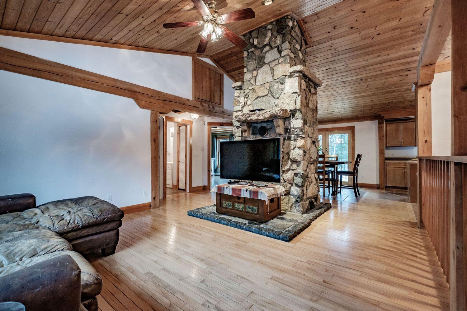 374 Songo School Road Naples, ME 04055 - Photo 17 of 25 Stone fireplace