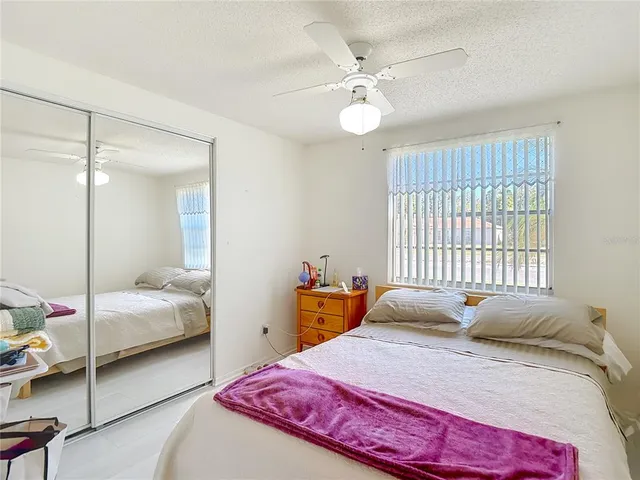 a bathroom with a sink vanity mirror and toilet