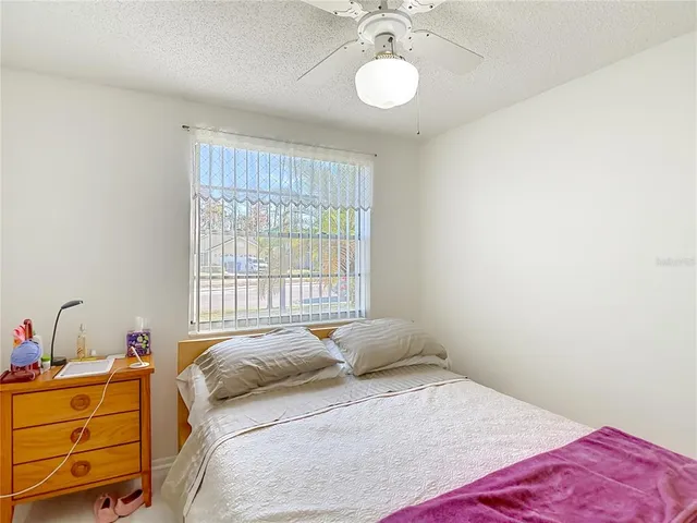 a bathroom with a sink toilet vanity and a mirror