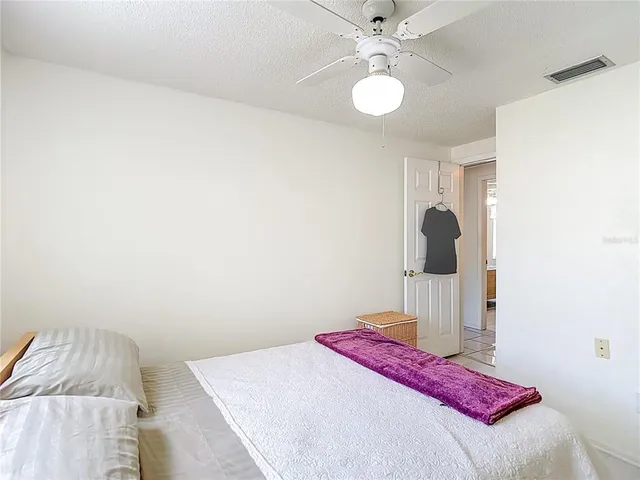 a livingroom with workspace and a window