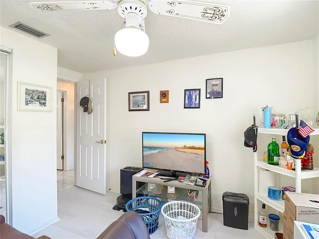 a bathroom with a sink toilet vanity and shower