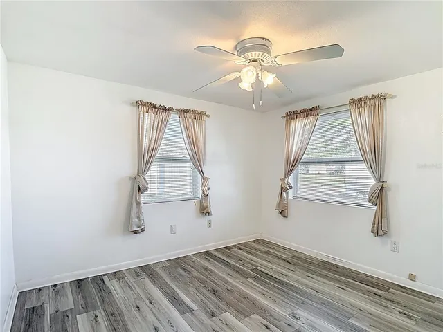 a utility room with closet dryer and washer