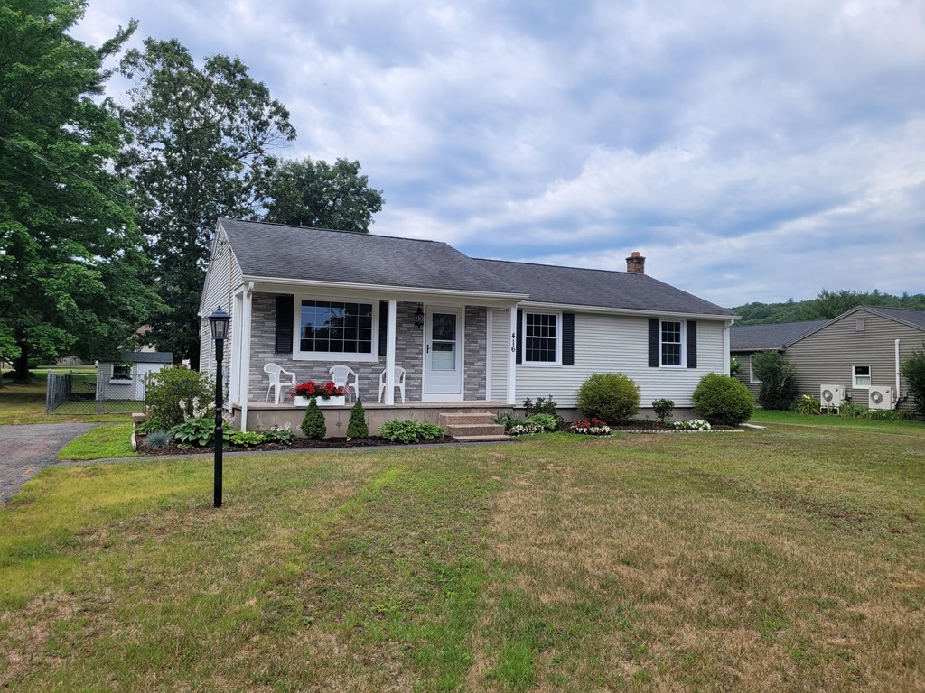 416 Southampton Road Holyoke, MA 01040 - Photo 1 of 12 a view of a house with a yard and sitting area