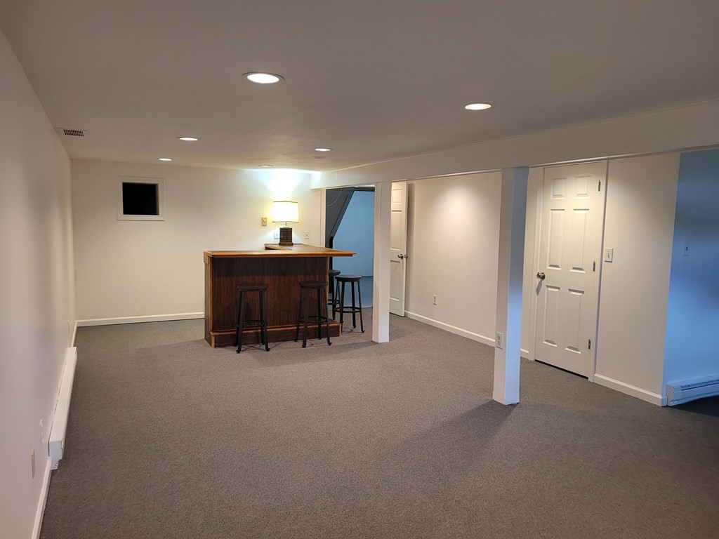416 Southampton Road Holyoke, MA 01040 - Photo 11 of 12 a view of a livingroom with furniture and chandelier