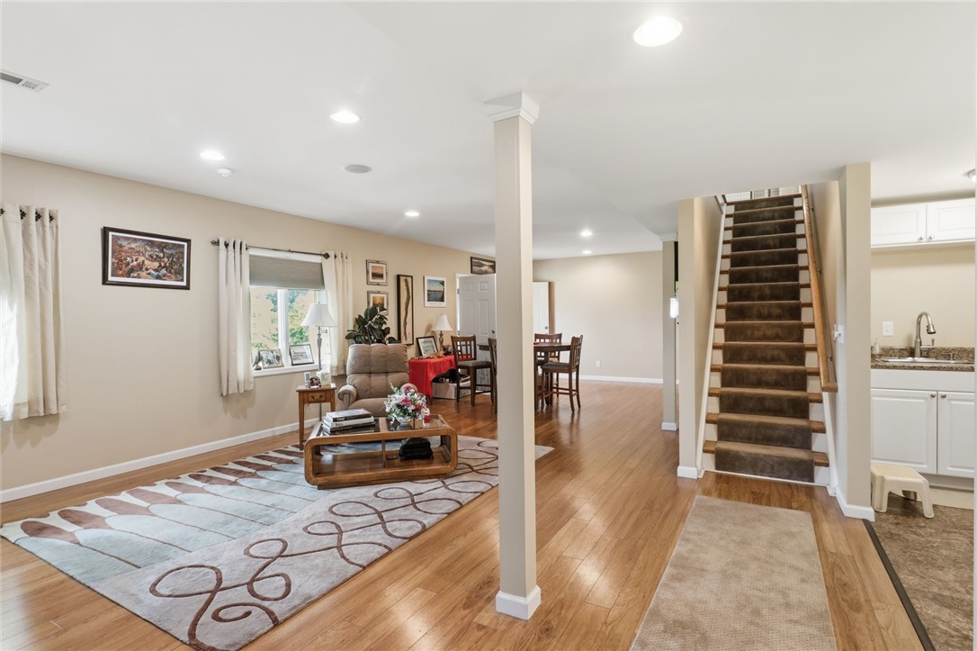 4536 Crystal Ridge Circle Gorham, NY 14424 - Photo 30 of 48 This expansive lower level has been thoughtfully designed and finished to offer maximum versatility, making it the perfect setting for a private in-law suite, or a comfortable, secluded living space for visiting guests.