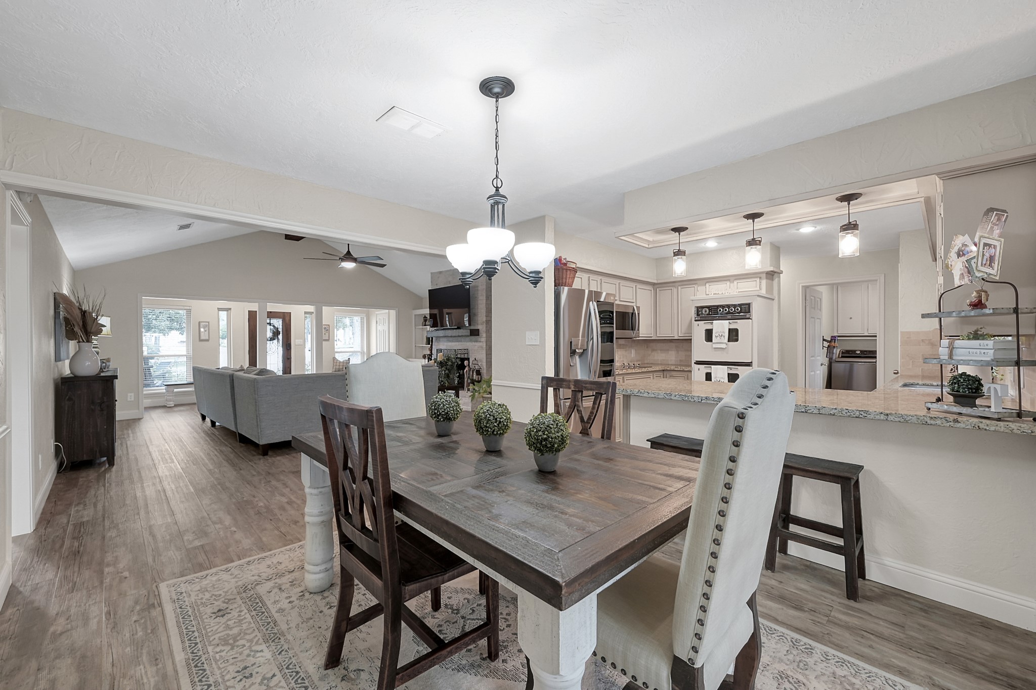 8 Cambridge Road Conroe, TX 77304 - Photo 12 of 44 a dining room with furniture and window