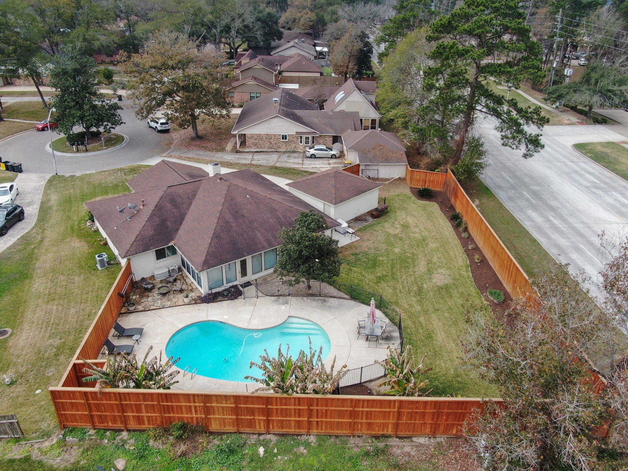 8 Cambridge Road Conroe, TX 77304 - Photo 40 of 44 an aerial view of a house with outdoor space