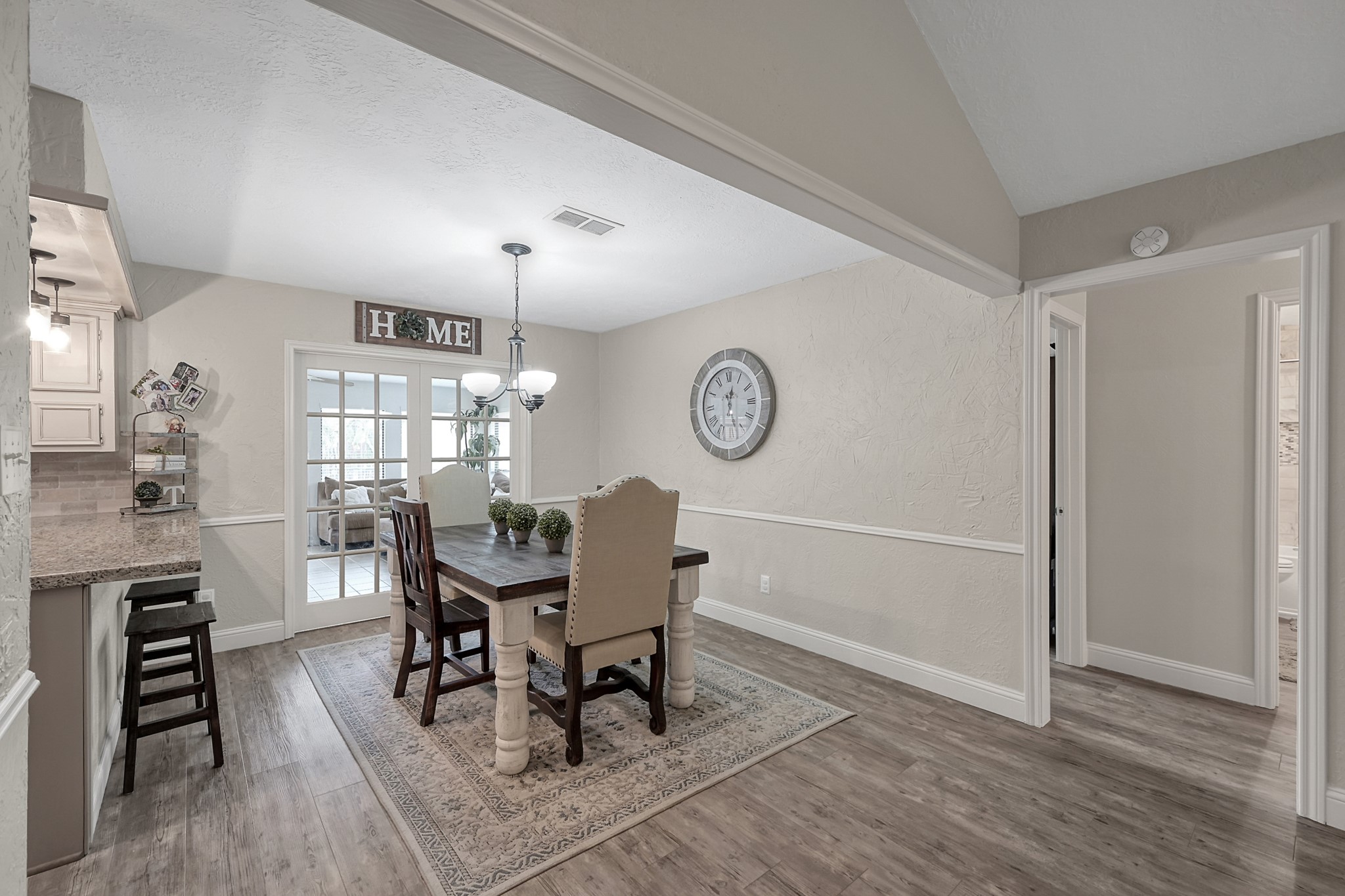 8 Cambridge Road Conroe, TX 77304 - Photo 9 of 44 a view of a dining room with furniture and window